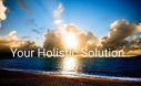 Logo featuring a sunrise over the water and containing the words 'Your Holistic Solution'